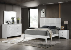 This bedroom collection is the embodiment of sleek, contemporary design, characterized by its crisp white finish and distinctive textured front panels. The centerpiece, a chic bed with a statement headboard, features geometric paneling that adds depth and