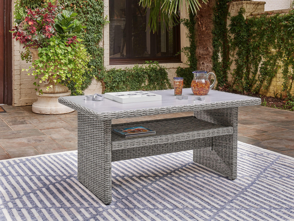 Indulge in backyard bliss. This outdoor multi-use table has a straightforward sense of style with its light gray resin wicker. The table-'s rust-proof aluminum is enhanced with a wood-look finish, weathering the elements and keeping your aesthetic casuall
