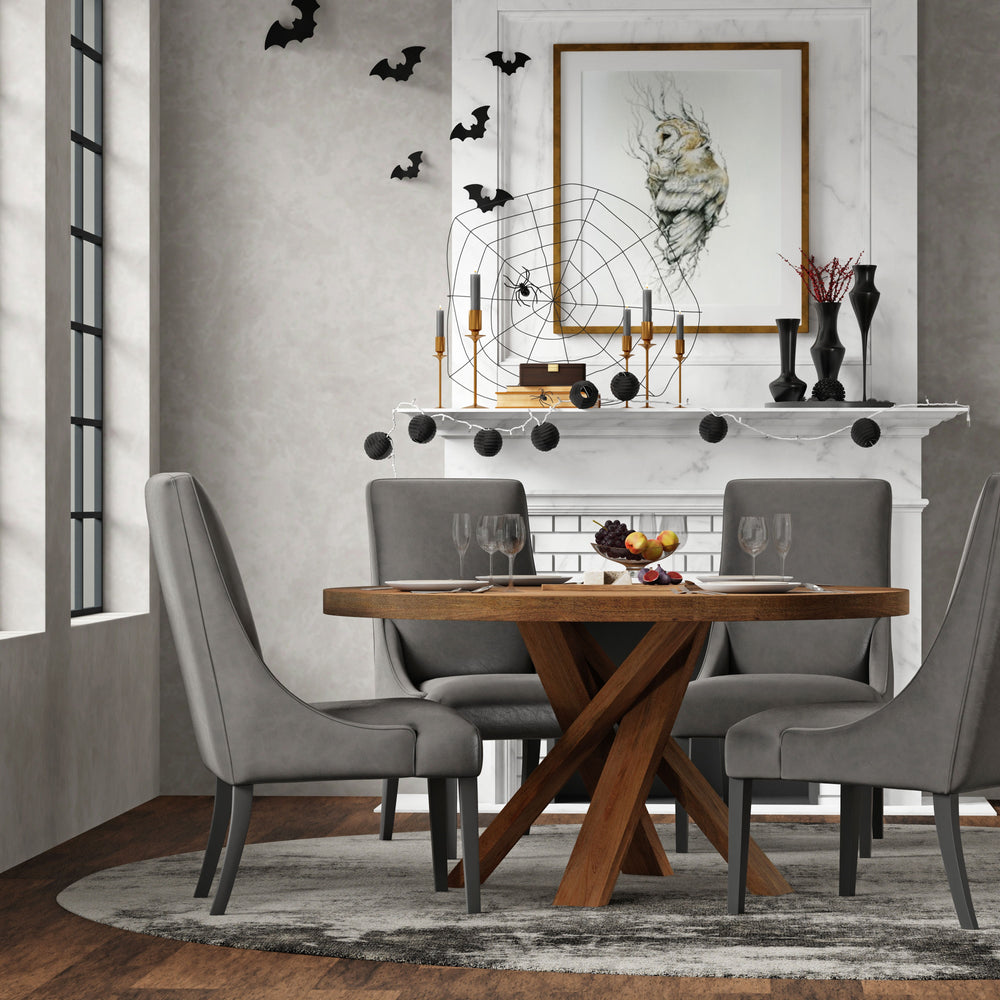 Bring a touch of global-inspired elegance to your dining room with the 60 Inch Round Dining Table. This handcrafted table is made from solid mango, giving it a unique aesthetic with natural variations of color, wood grain, and knots. The round table is pa