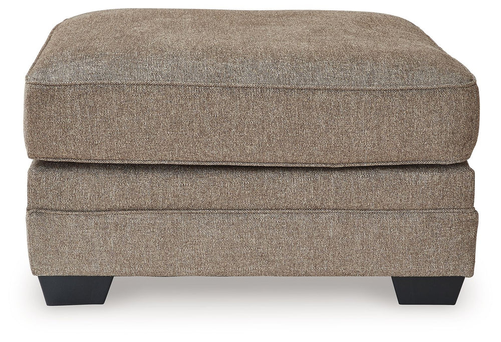 Classic, contemporary and cozy. With this ottoman, relaxing in style is made easy. It takes a warm and inviting approach to versatile color, incorporating posh character into your space with menswear-inspired upholstery. Living room lounging has never bee