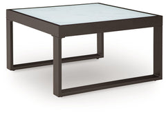 Sleek, contemporary style meets outdoor living in this coffee table. Its clean-lined black aluminum frame expertly balances good looks and longevity. A stunning top provides the natural stone look you love, while its glass construction weathers the season