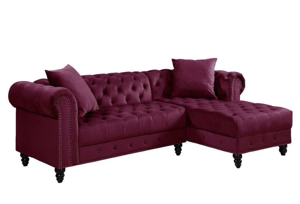 Create a chic living room with the Adnelis sectional sofa. It is beautifully upholstered in lustrous velvet. It is designed with spectacular attention to fine details such as button tufting and nail-head trim accents. The rolled armrests add a regal touch