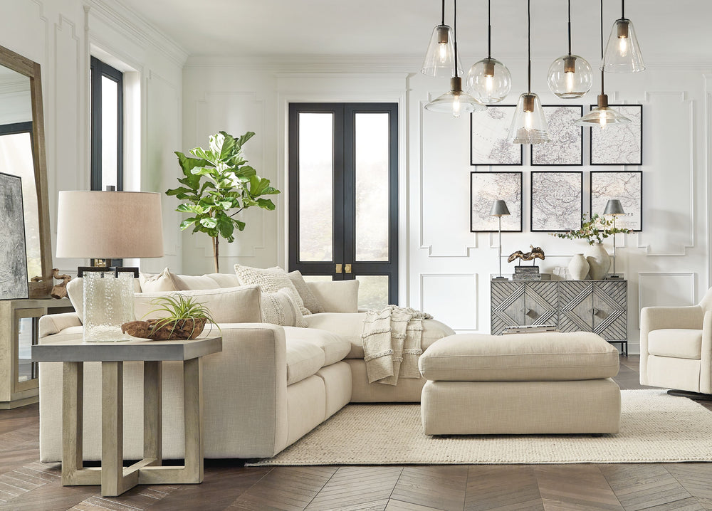Down with uptown style. This sectional and ottoman goes to town with a high-design aesthetic, sleek sophistication and sumptuous comfort that are temptingly affordable. Wide track arms, softened by plush side pillows, offer a welcoming look and feel, whil