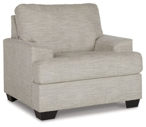 Laid-back luxury meets neutral practicality in this chair. Taking its cues from contemporary design, the clean-lined piece is outfitted with angular arms for a layer of geometric expression. A softly upholstered, sizable cushion keeps you comfortable when