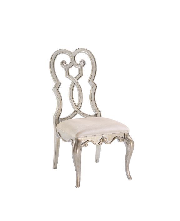 Every piece in the Esteban dining collection reflects vintage glam style! Gorgeous details such as raised scroll trim and crystal handles with mirrored fronts on the case pieces transform the entire collection into something extraordinary. The antique cha