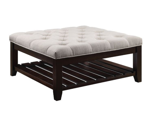 Add flexible designs and versatile functions to your seating arrangement. The Aizen Cocktail Ottoman has a durable wooden frame with a slatted tier shelf. Button tufted cushion above the frame maintains stylish comfort. This brilliant piece offers a extra