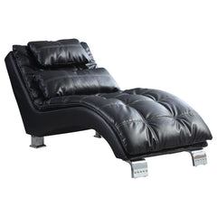 Impart ultimate relaxation with the refined look and plush feel of this upholstered chaise. Square tufting and double row stitching highlight black leatherette upholstery and create dimensionality. Complete with a delightful curve that cradles the body, t