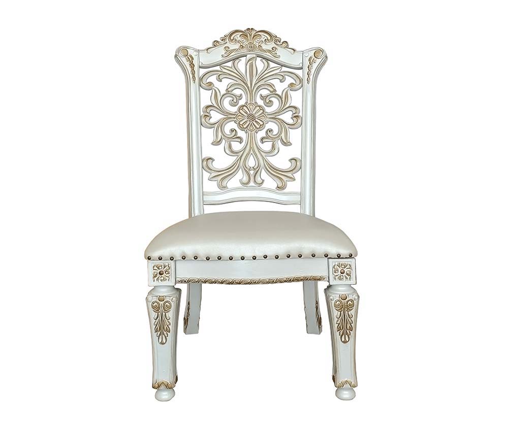Commanding attention in any space, the impressive design of the Vendom double pedestal dining table will impress everyone. Adorned with classic elements including scrolls, curved shapes, and leaf molding accents to create an old-world charm. The antique p