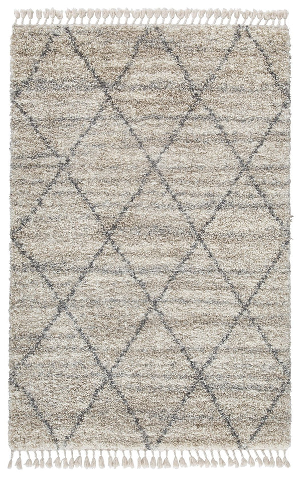 Shake up your style with woven shag. This area rug offers a deliciously comfortable underfoot experience. With a diamond design and braided tassel edge, this floor covering carries a variegated gate pattern in beige, white and shades of gray to elevate yo