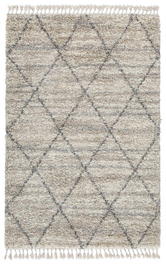 Shake up your style with woven shag. This area rug offers a deliciously comfortable underfoot experience. With a diamond design and braided tassel edge, this floor covering carries a variegated gate pattern in beige, white and shades of gray to elevate yo