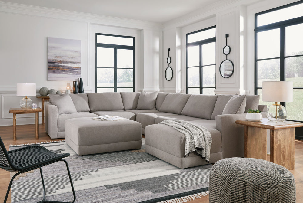 Searching for seating that expertly harmonizes form and function? This sectional with chaise and ottoman has you covered. Making a sleek statement in spaces from transitional to modern, its neutral upholstery brings an airy, upscale feel to the clean-line