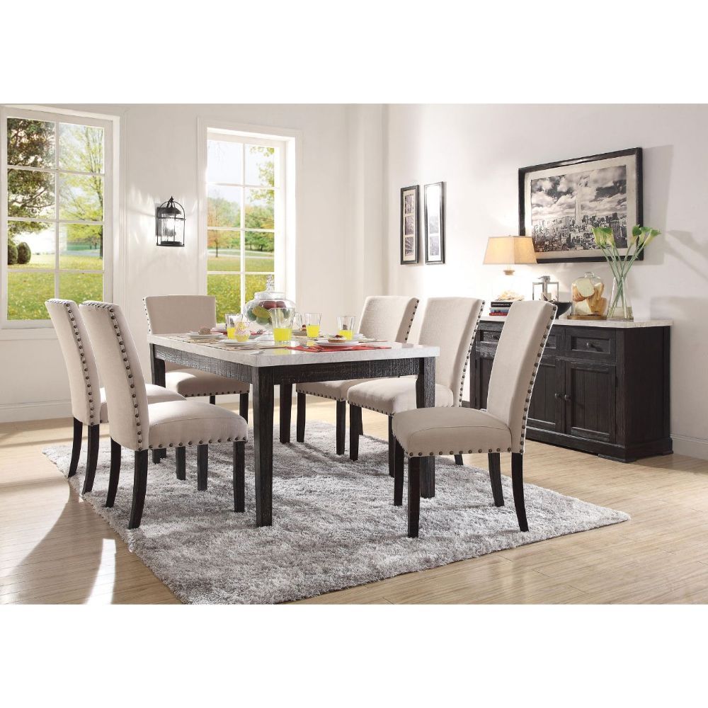 The Nolan marble dining collection offers an elegant design to turn your dining area into the most eye catching spot of your house. Each piece is supported by a strong wooden base in salvage dark oak, contrasting the flawless white marble table top and be