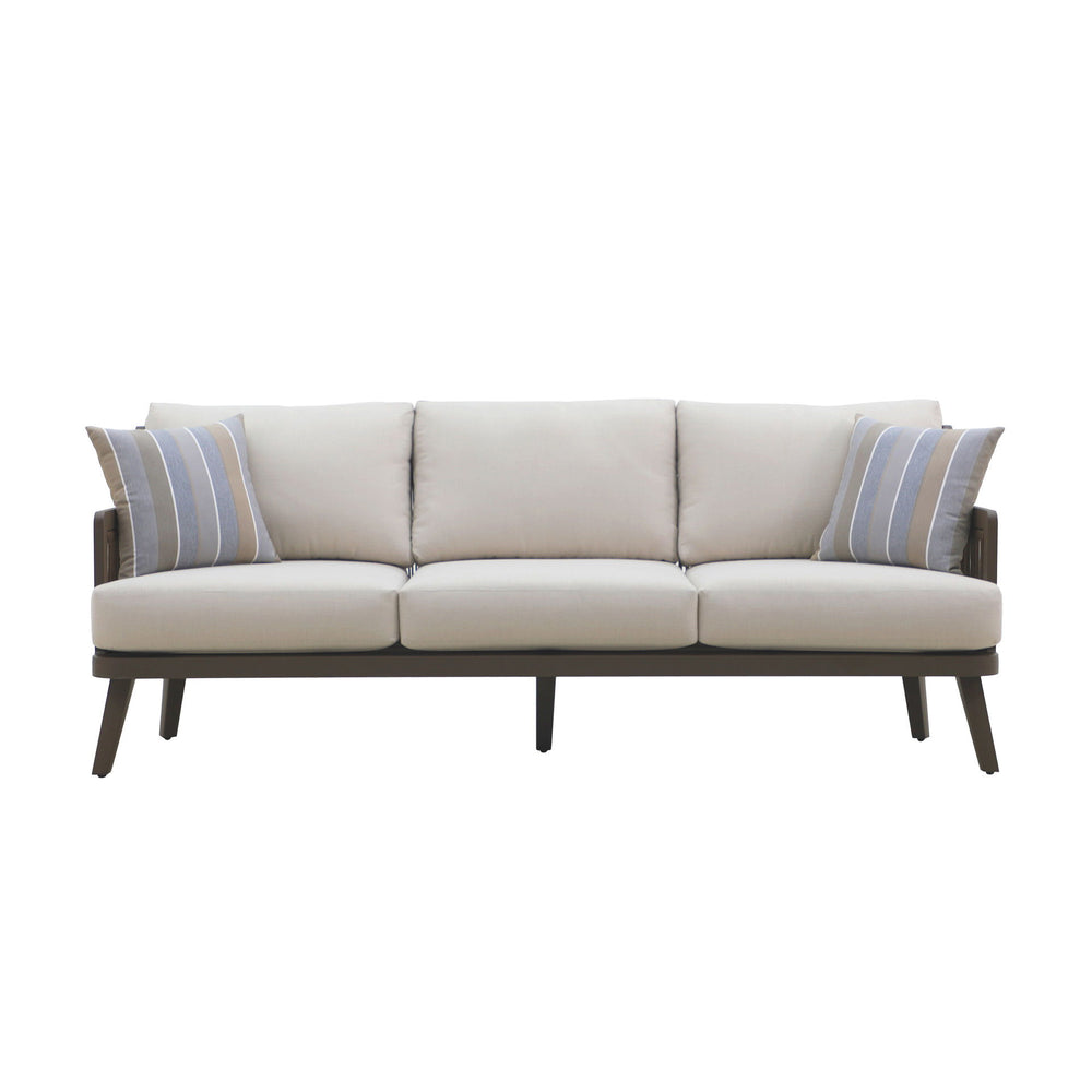 The Genova Patio Sofa with two accent pillows offers a perfect blend of durability, comfort, and style for your outdoor living space. Built with a strong aluminum frame and a baked-on powder coat, this sofa is designed to withstand scratches and ensure lo