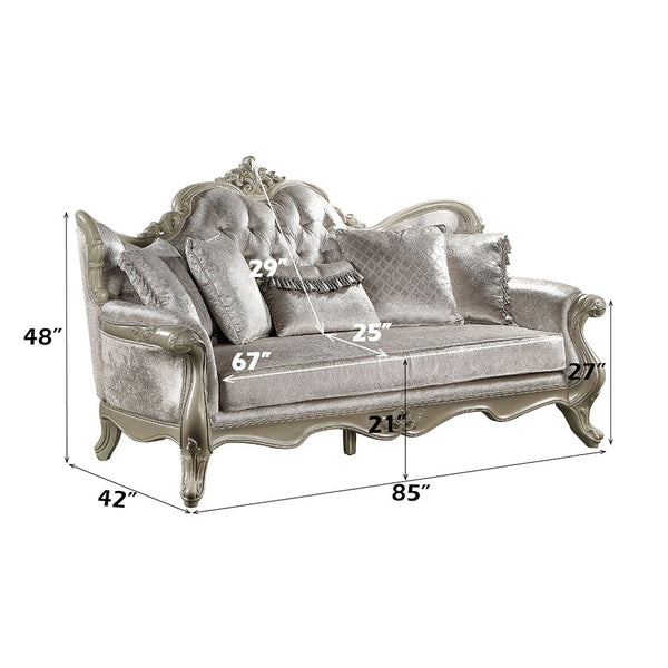  and armrests with a wooden inner frame. The tight back and loose seat cushions