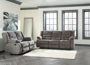This reclining set puts the win in winning. Its waterfall back design and doubly plump pillow top arms team up with soft chenille fabric to go for the goal. Ample seating room makes the comfort possibilities endless. Sit back and relax. You wonâ€™t go wro