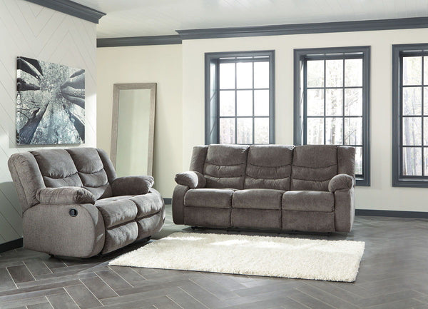 This reclining set puts the win in winning. Its waterfall back design and doubly plump pillow top arms team up with soft chenille fabric to go for the goal. Ample seating room makes the comfort possibilities endless. Sit back and relax. You wonâ€™t go wro