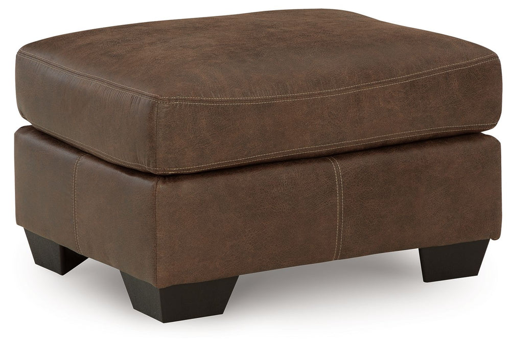 If you love the cool look of leather but long for the warm feel of fabric, you-'ll find this ottoman fits the bill beautifully. Enhancing its handsome profile: a textural, multi-tonal upholstery thatâ€™s loaded with character and interest. What a rich add