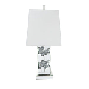  this Noralie Table Lamp will bring a touch of Hollywood glamourous to any room space. Featuring cuboid shape with mirrored finish and trimmed with clear glass of faux diamond inlayed