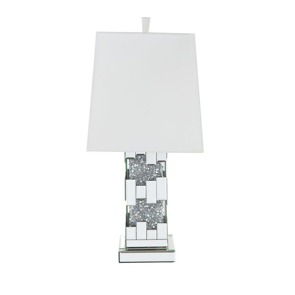  this Noralie Table Lamp will bring a touch of Hollywood glamourous to any room space. Featuring cuboid shape with mirrored finish and trimmed with clear glass of faux diamond inlayed