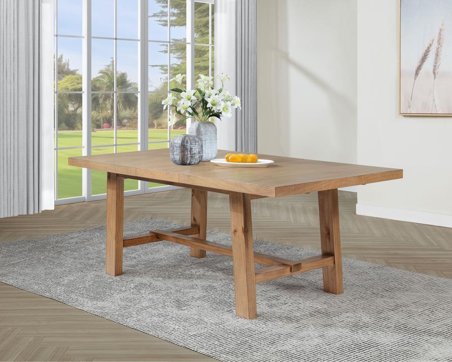 This extension dining table elevates your gathering space with warm sophistication. Its removable 16-inch leaf transforms the length from 60 to 76 inches, accommodating everything from intimate dinners to lively family feasts. Crafted from solid mahogany,