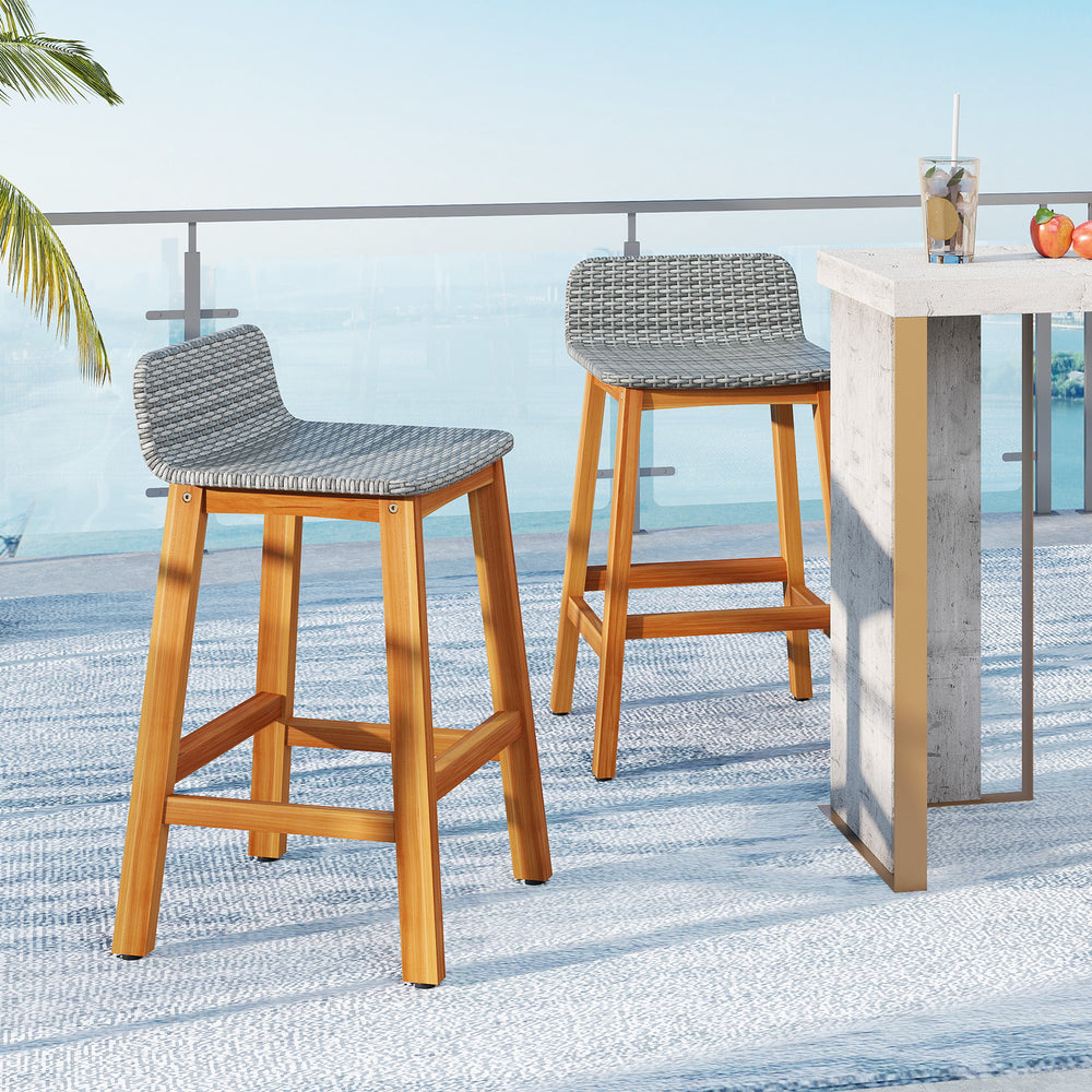 High-quality acacia wood construction for durability<br>Splinter-free surfaces for a smooth and safe touch<br>Ergonomic design with a supportive backrest and curved armrests<br>PE rattan seat is fade-resident for long-time use<br>Added footrests for a coz