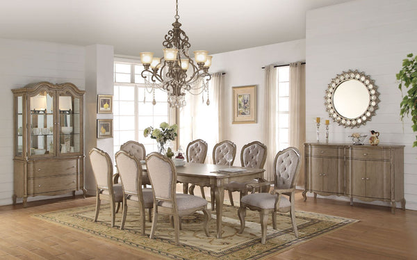 Crafted with curved apron table leg and button tufted chair back in light color, the Chelmsford collection will create your dining room a relaxing environment and be a more comfortable. Featured two leaves extension that allow the dining table have more r