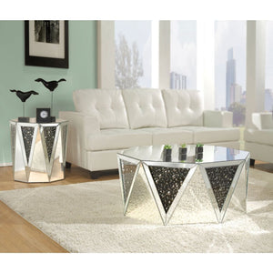 The Noor mirrored occasional table will add a modern glam style to your living room. This drum table features a sleek and unique style with its octagonal top, triangular base, and crystal inserts. Add this coffee table to any room to add to add style and 