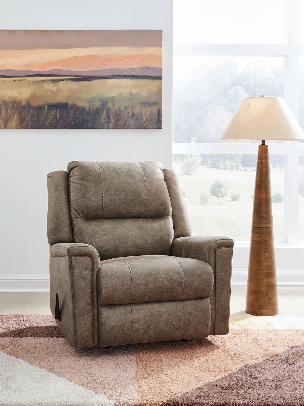 When it comes to the exquisite, decadent styling of this rocker recliner, sitting is believing. Its generous seat and tall back are specially crafted to provide extra support and comfort for broader and taller individuals. This recliner is made for easy a