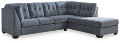 This sectional with chaise takes a homey approach to high style. Its denim-inspired fabric has classic versatility, while a contemporary silhouette and stitched details keep the look totally on trend. And you can count on comfortâ€”the chaise invites you 