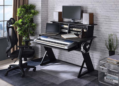 Keep your recording studio space organized while you create musical masterpieces with the Annette music desk. Smaller in size yet still powerful, the dek can securely hold all your equipment and gear. The shelf can be used to mount a monitor and speakers.