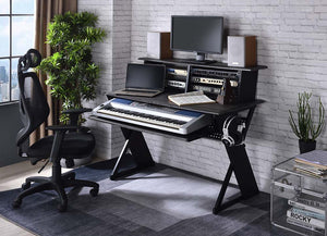 Keep your recording studio space organized while you create musical masterpieces with the Annette music desk. Smaller in size yet still powerful, the dek can securely hold all your equipment and gear. The shelf can be used to mount a monitor and speakers.