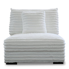 The Embrace Armless Chair with 1 Accent Pillow in white offers a perfect blend of comfort and style, enhancing any living space. Upholstered in 100% white polyester fabric with a fluffy, blanket-like texture, this chair is designed for ultimate relaxation