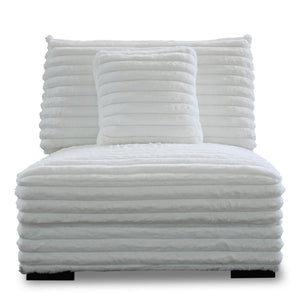The Embrace Armless Chair with 1 Accent Pillow in white offers a perfect blend of comfort and style, enhancing any living space. Upholstered in 100% white polyester fabric with a fluffy, blanket-like texture, this chair is designed for ultimate relaxation