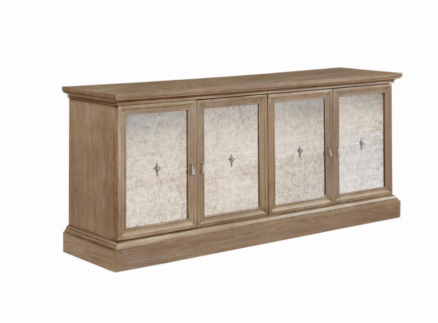 A four-door server is accentuated with antique mirror door fronts to create a rich, classic accent piece. Drawing the eye, this dining room addition is just the finishing touch you-'ve been searching for. Plentiful storage creates space for various types 