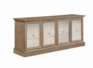 A four-door server is accentuated with antique mirror door fronts to create a rich, classic accent piece. Drawing the eye, this dining room addition is just the finishing touch you-'ve been searching for. Plentiful storage creates space for various types 