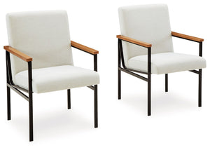Discover something extraordinary with this upholstered dining arm chair. Its wood armrests are paired with a black metal frame for a clean-lined contemporary appeal. Strikingly simple, this piece creates an understated, modern feast for the eyes whether i
