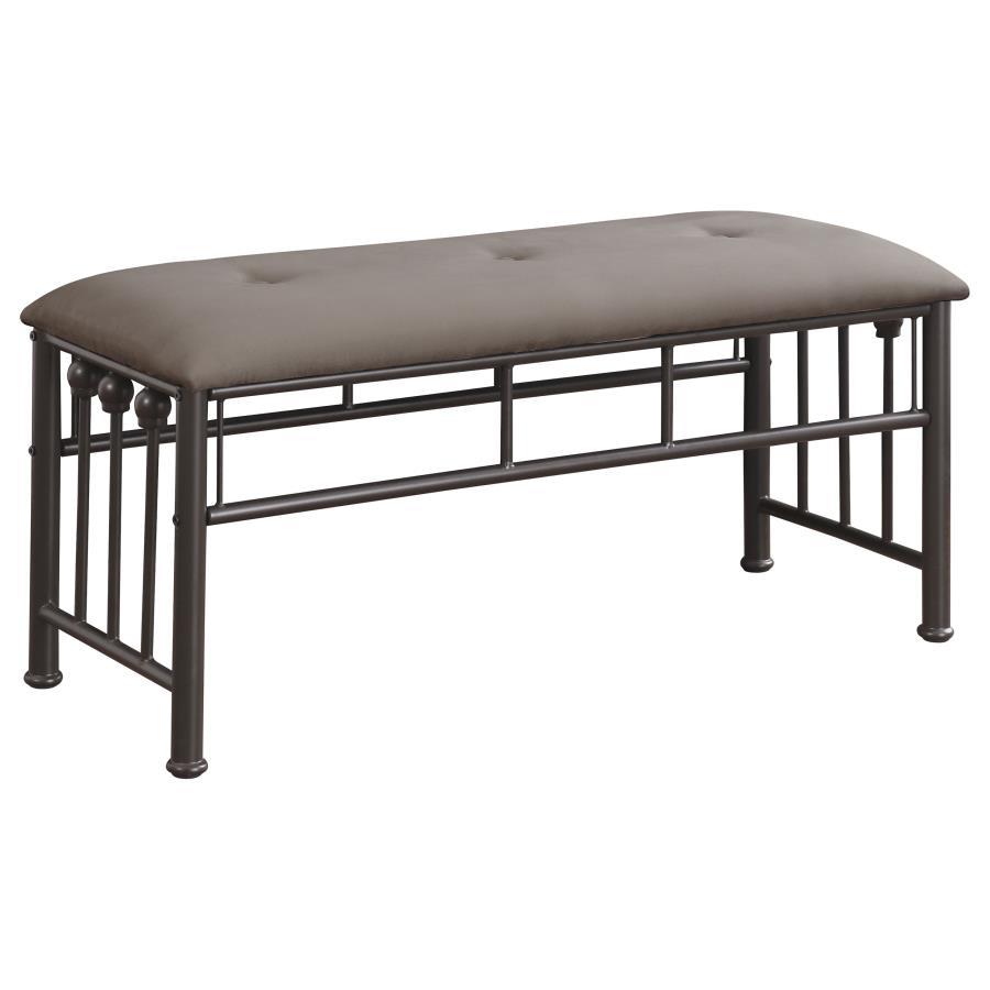Add versatile seating to your home with this farmhouse-inspired metal bench. Designed with a sturdy dark bronze powder-coated frame, it includes a softly cushioned seat upholstered in brown microfiber for added comfort. Vertical rods and ball accents echo