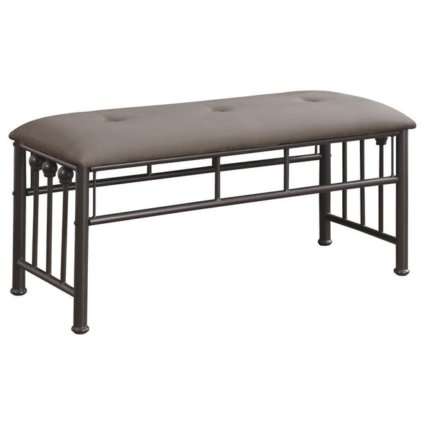 Add versatile seating to your home with this farmhouse-inspired metal bench. Designed with a sturdy dark bronze powder-coated frame, it includes a softly cushioned seat upholstered in brown microfiber for added comfort. Vertical rods and ball accents echo