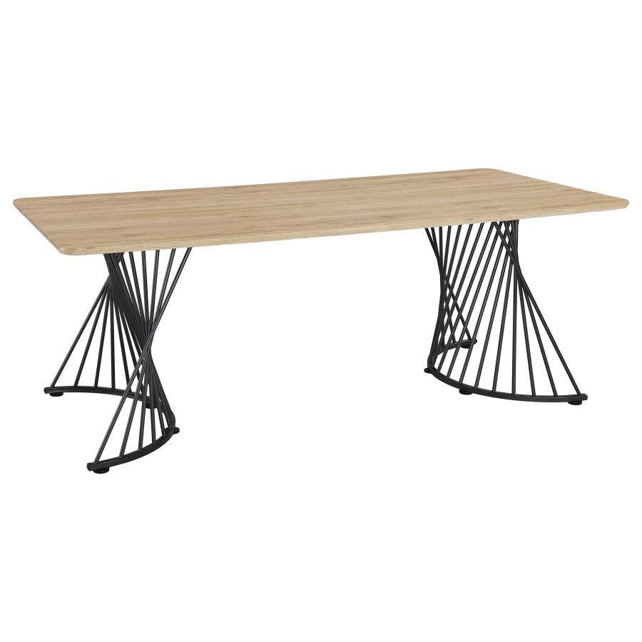 Make a statement in your dining room with this sculptural rectangular table, combining rustic charm and industrial flair. Featuring a natural oak grain top with a durable, easy-care laminate veneer, it sits on bold dual pedestal bases crafted from twisted