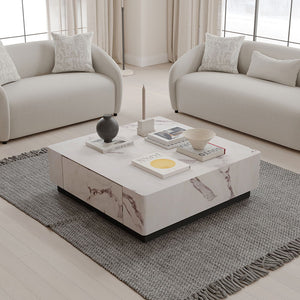 Introducing the Fritzy collection, a masterpiece of modern elegance in a striking white finish. These pieces, characterized by clean lines and a chic aesthetic, elevate any living space with their sophisticated presence. The coffee table and the uniquely 