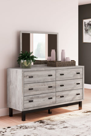  this two-toned bedroom set brings sleek style to your space. With this chic set