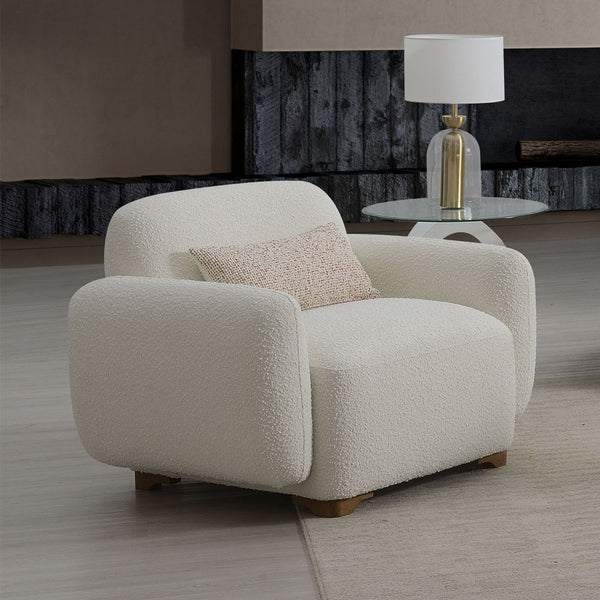 Step into a world of sophisticated comfort with the Darius Collection Sofa Set, beautifully upholstered in luxurious Boucle fabric. This exquisite set, with its soft, textured finish and plush cushioning, invites you to sink into relaxation and unwind in 