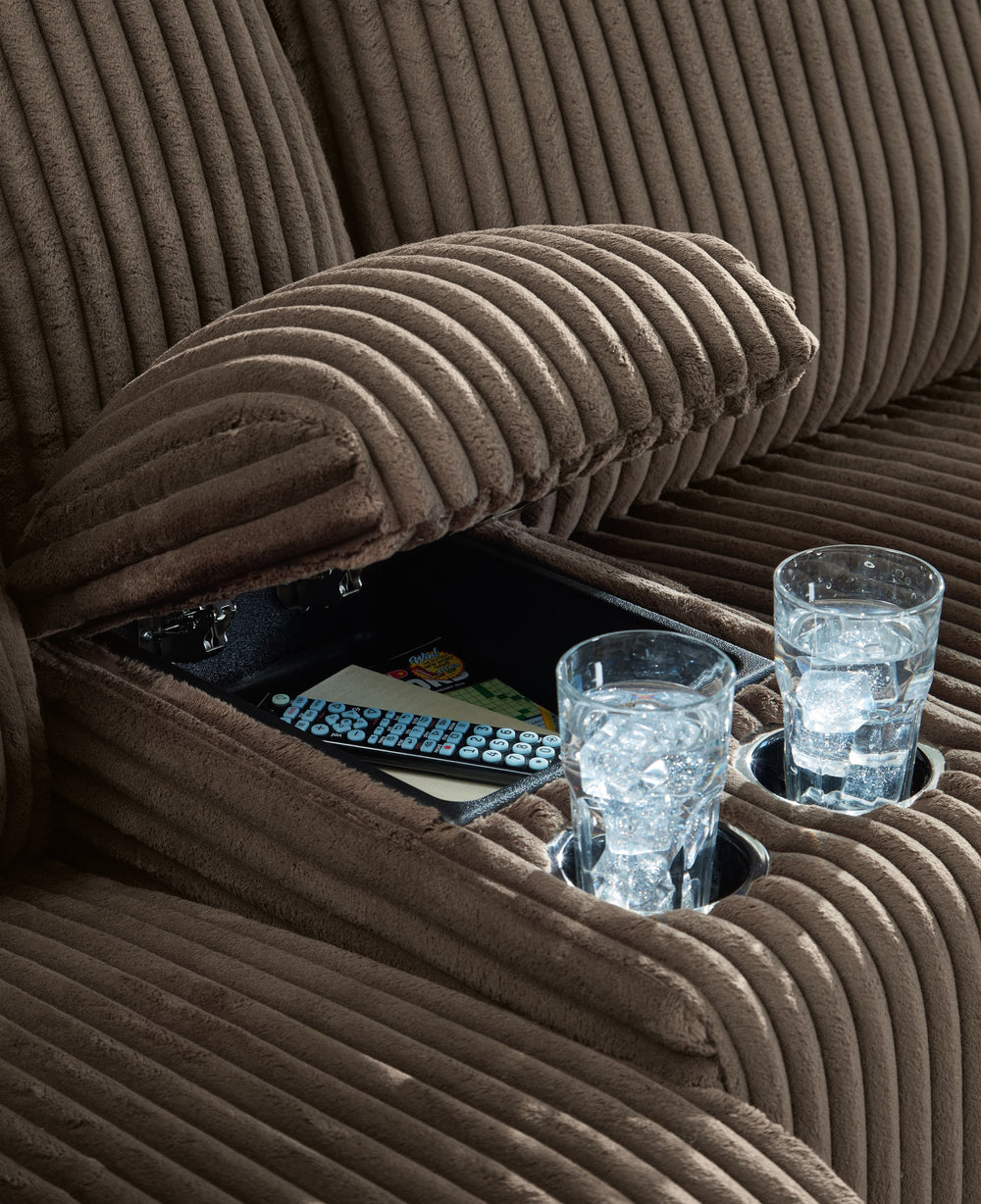 Experience unparalleled comfort with this reclining sectional with chaise. Itâ€™s a stylish and invitingly soft lookâ€”made all the more appealing by cozy corduroy cushions that feel great and add a touch of texture. The rich chocolate brown upholstery ef