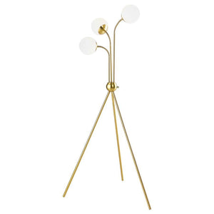 A trio of milky white globes sprout from the center of a charming mid-century modern three-light floor lamp. Delivering a warm, diffused glow in your living area or bedroom, the eye-catching lamp features a bold tripod base with a round accent from which 