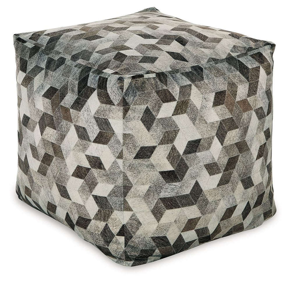 Fall into line with the geometric design of this pouf. Sporting faux hair on hide, this supportive shape in shades of gray and brown invigorates your decor with casually cool flair. Destined to become your favorite footrest, the pouf can also be topped wi