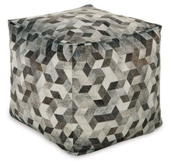 Fall into line with the geometric design of this pouf. Sporting faux hair on hide, this supportive shape in shades of gray and brown invigorates your decor with casually cool flair. Destined to become your favorite footrest, the pouf can also be topped wi