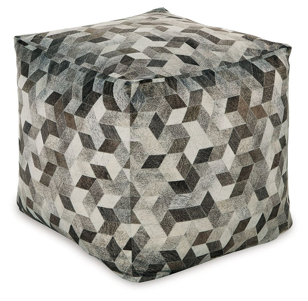 Fall into line with the geometric design of this pouf. Sporting faux hair on hide, this supportive shape in shades of gray and brown invigorates your decor with casually cool flair. Destined to become your favorite footrest, the pouf can also be topped wi