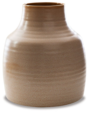 This vase looks beautiful on a shelf in the living room or as a centerpiece on your dining room table displaying your favorite blooms. The vase is finished with a reactive glazeâ€”a technique admired for its variegated coloringâ€”so each is one of a kind.