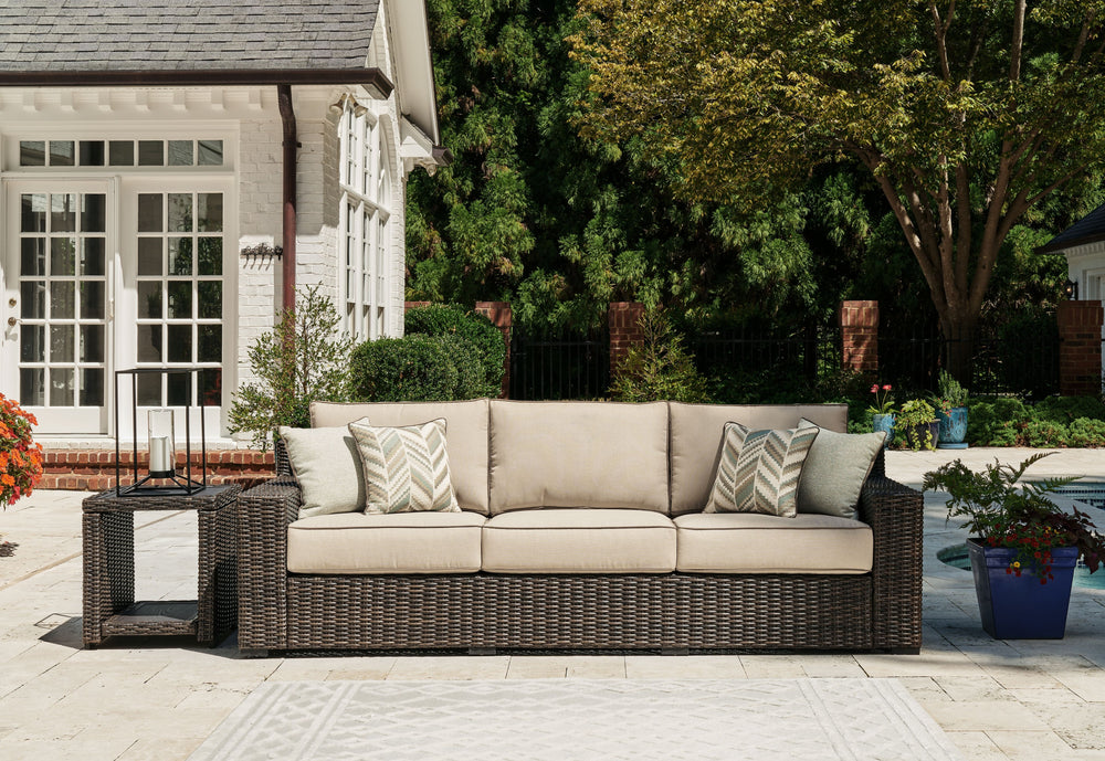 Who says the great outdoors isnâ€™t made for luxury living? This sofa with cushion offers all the high-end design, plush comfort and durability you could ask for, and then some. Its all-weather, rust-proof aluminum frame provides the easy-breezy wicker lo