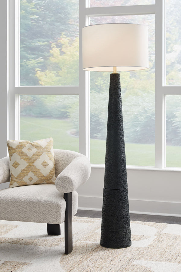  it wows with a textured black finish and stylish drum shade